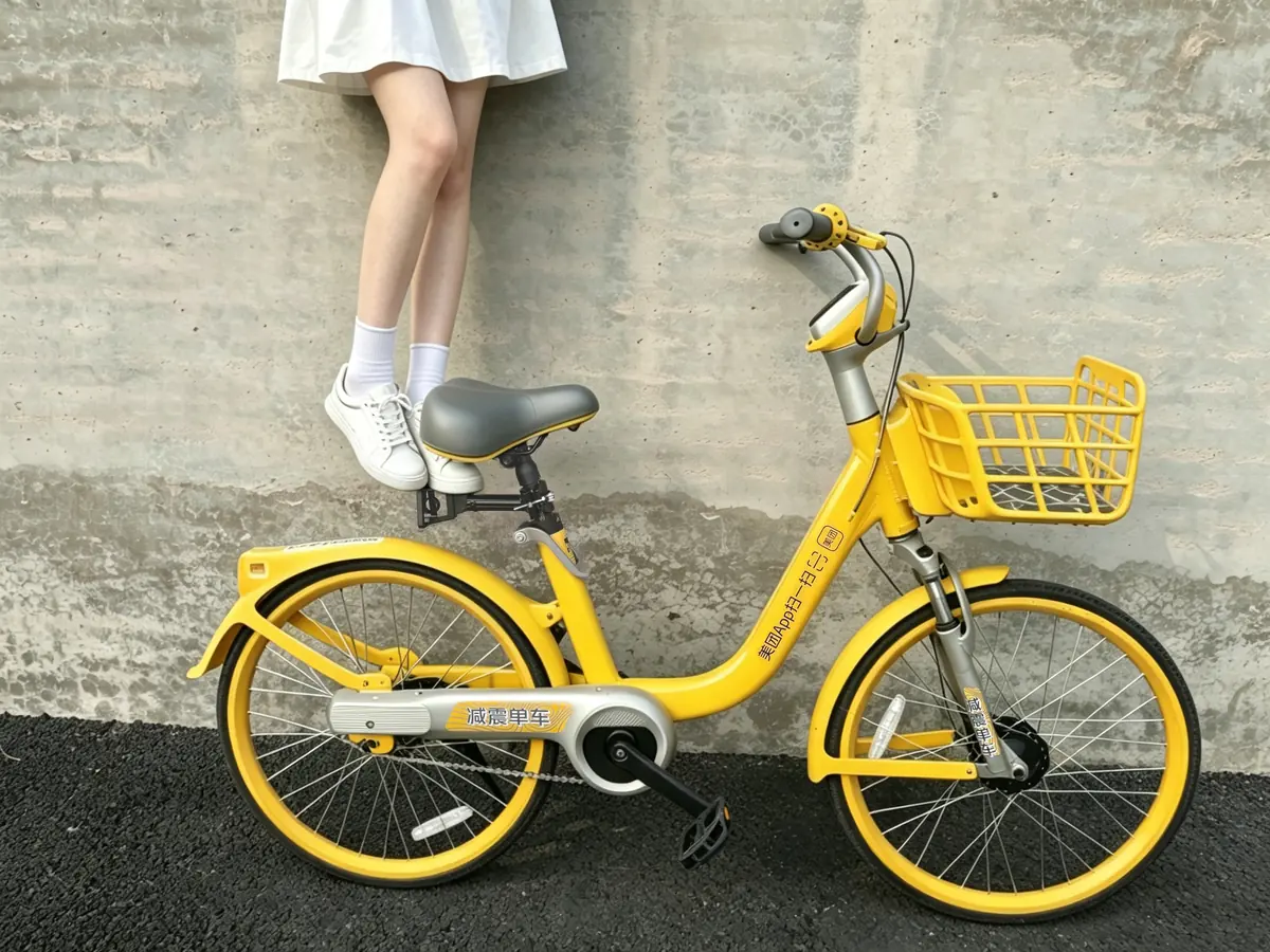 Person standing on a Seatpost Hugger behind the saddle of a yellow share bike