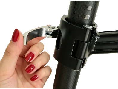 Hand opening the quick-release lever on a Seatpost Hugger clamp
